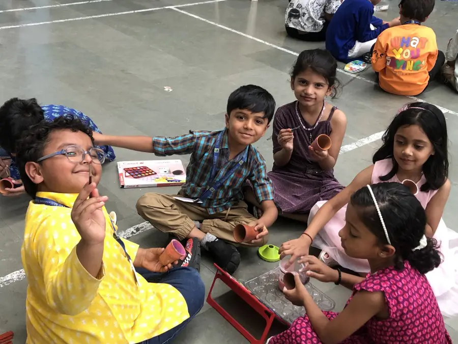 Young students making crafts together